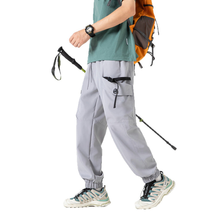 Unisex Weite Technical-Cargo-Jogginghose mit verstellbarem Tunnelzug, großen Klapptaschen und elastischem Knöchelabschluss Drune