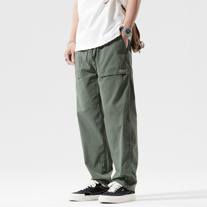 Herren Baggy-Cargo-Hose im Workwear-Look mit elastischem Kordelbund, aufgesetzten Klapptaschen und verstärkten Nähten Drune