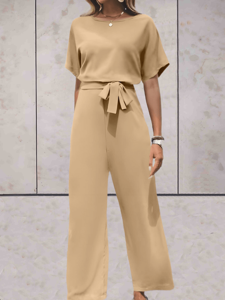 Drune - Jumpsuit mit Gürtel und kurzen Ärmeln