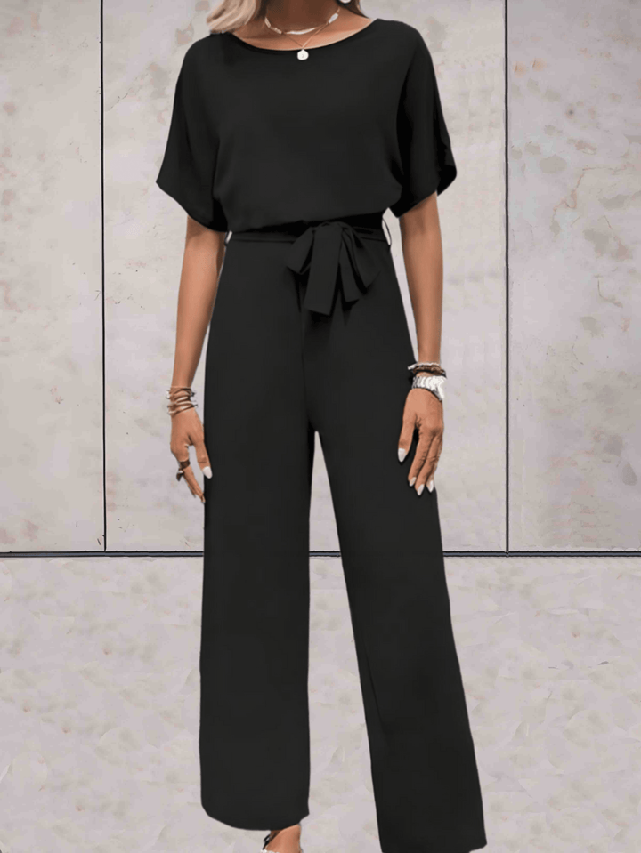 Drune - Jumpsuit mit Gürtel und kurzen Ärmeln