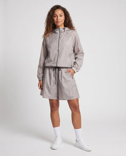 Damen Ultraleichte Kapuzen‑Regenjacke mit Kordelzug und Raglanärmeln Drune