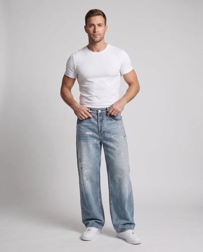 Herren weit geschnittene Vintage-Denim Jeans mit Used-Effekten und Paint-Splatter Drune