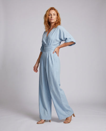 Damen Weit geschnittener Jumpsuit mit tiefem V-Ausschnitt und schickem Taillengürtel Drune