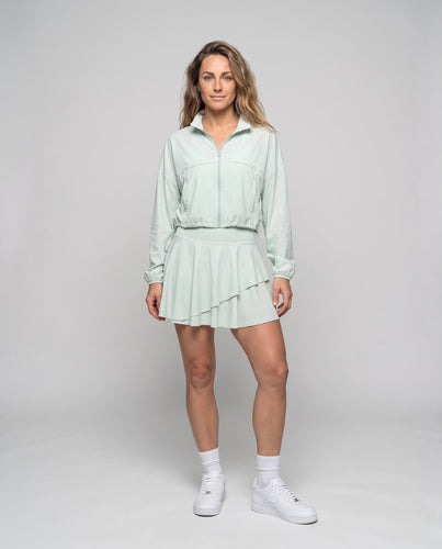 Damen nan sportive Kurzjacke aus funktionalem Jersey mit verdecktem Reißverschluss und elastischen Bündchen Drune