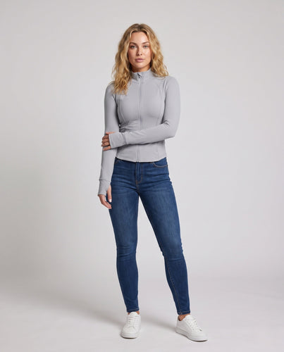 Damen nan taillierte Laufjacke mit Reißverschluss Stehkragen und Daumenlöchern aus elastischem Funktionsmaterial Drune