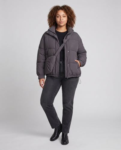 Damen Oversized gepolsterte Pufferjacke mit hohem Stehkragen und integrierter Schultertasche