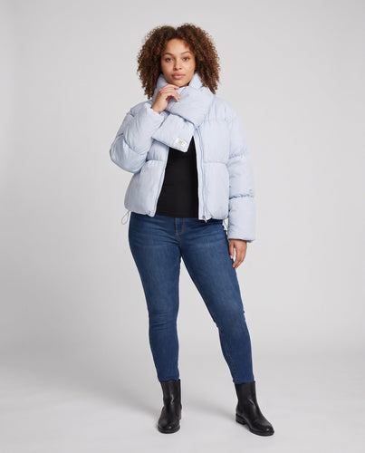 Damen kurz gepolsterte Pufferjacke mit integriertem Schalkragen und voluminösen Ärmeln