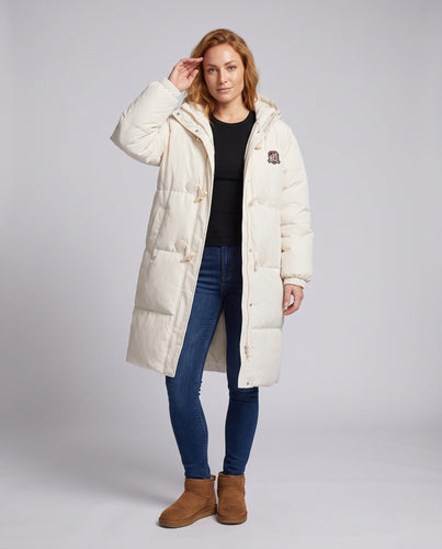 Damen langgeschnittene thermische Pufferjacke mit minimalistischer Knopfleiste, ergonomischem Stehkragen und geräumigen Seitentaschen