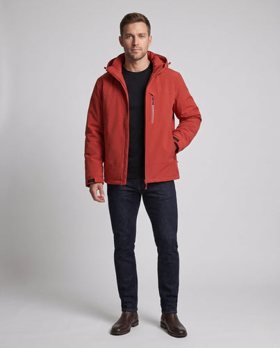 Männliche minimalistische funktionale Parka mit nahtversiegelten Reißverschlüssen, gepolstertem thermischem Futter und ergonomischer Kapuze