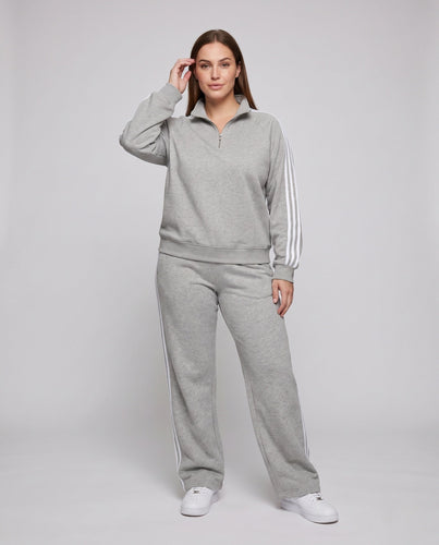 Unisex Oversize-Trainingsset aus French-Terry mit Halbzip, Raglanärmeln & weiten Seitenstreifen-Jogginghose