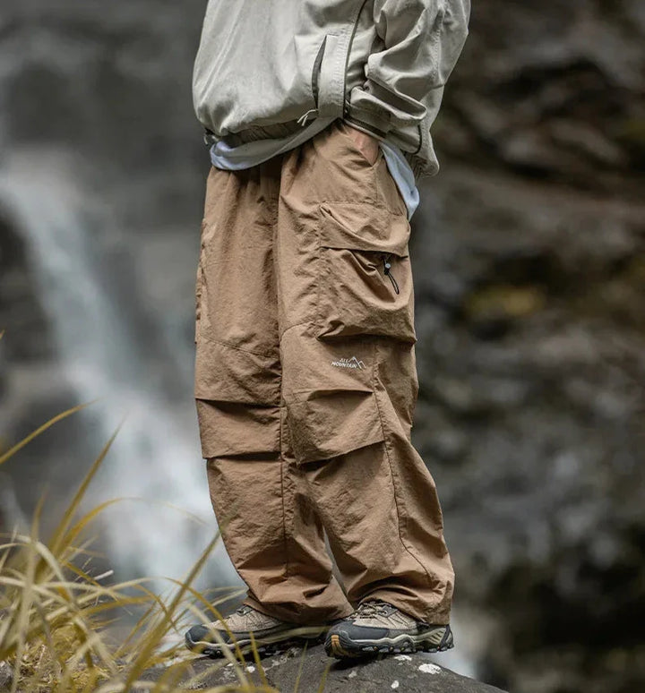 Drune Herren Cargohose mit seitlichen Taschen und weiter Passform