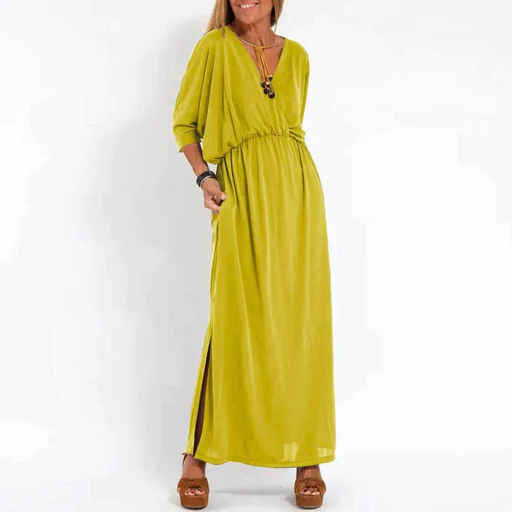 Langes Vintage Kleid mit Seitenschlitz in hoher Taille