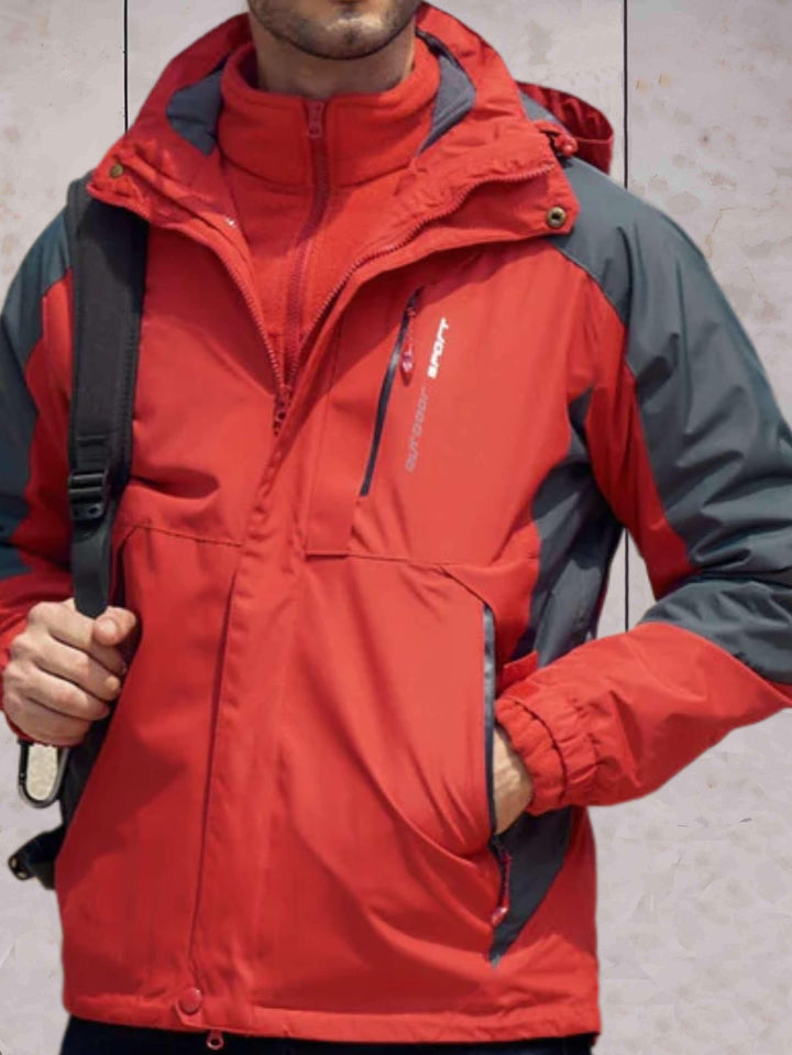 Drune | Wind- und wasserdichte Wanderjacke mit Kapuze, Taschen und doppeltem Reißverschluss und Knopfverschluss