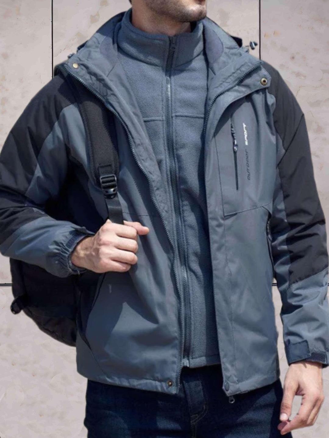 Drune | Wind- und wasserdichte Wanderjacke mit Kapuze, Taschen und doppeltem Reißverschluss und Knopfverschluss