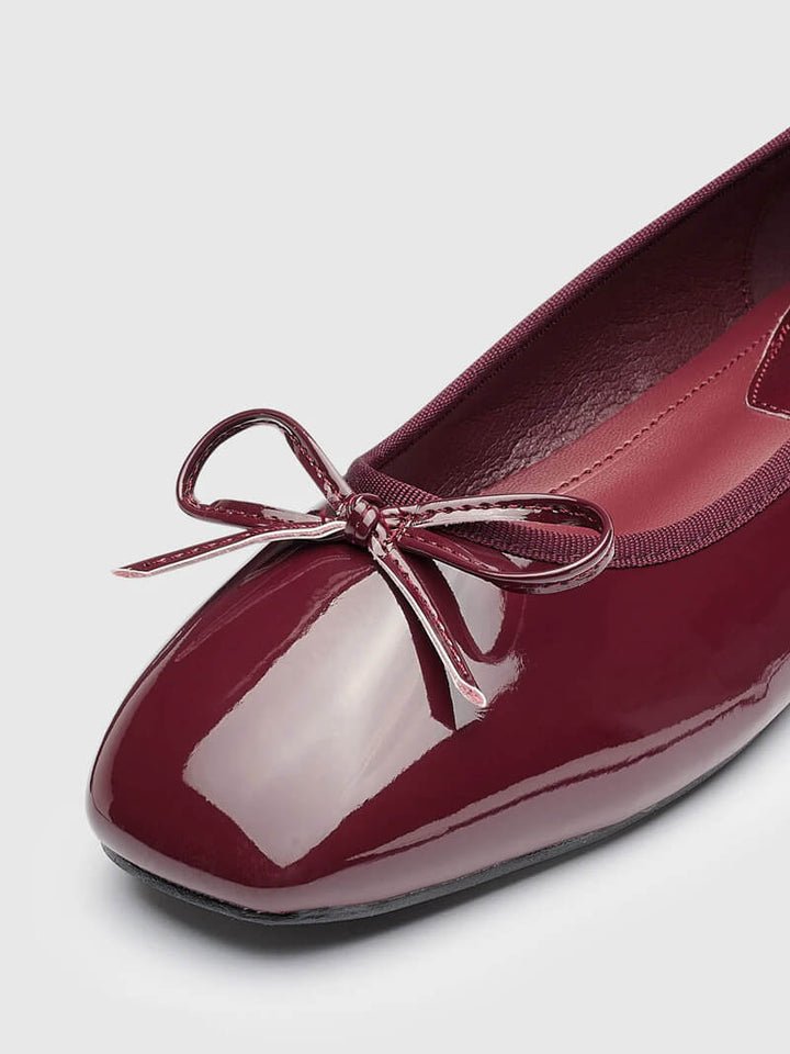 Drune | Ballerinas Mit Glänzender Lederverarbeitung Und Charmanter Schleife