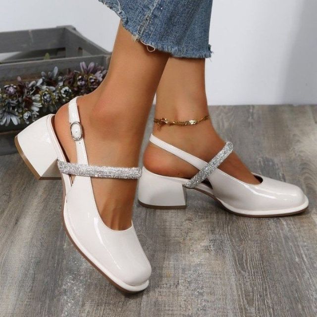 Glitzernde WeißlackPumps Drune