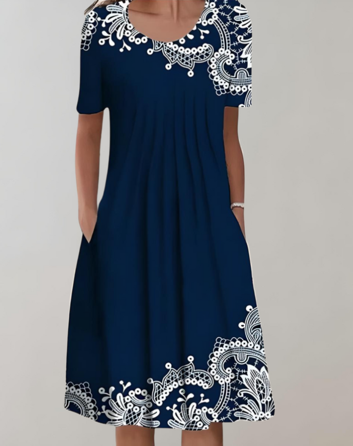 Drune | Kurze Ärmel, Lockeres Midikleid mit Blumenmuster und Taschen