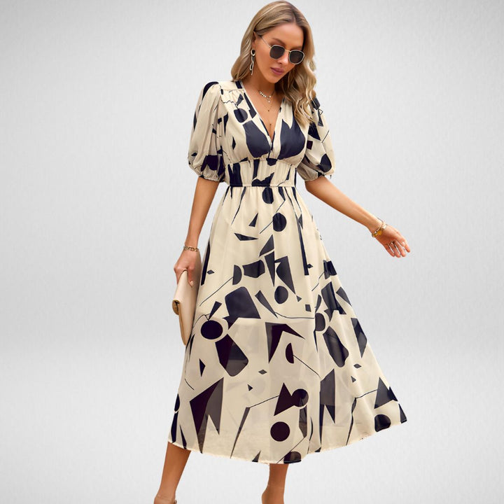 Drune | Abstrakt bedrucktes Maxikleid mit Puffärmeln