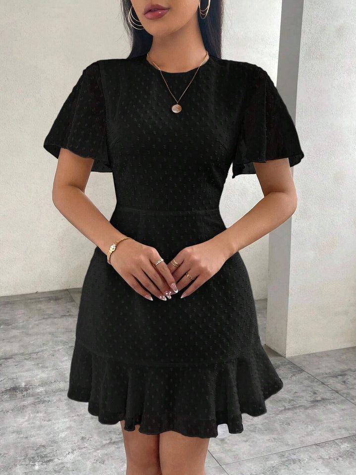 Drune | Dreidimensionales Kleid mit Rüschenrand und Punkten