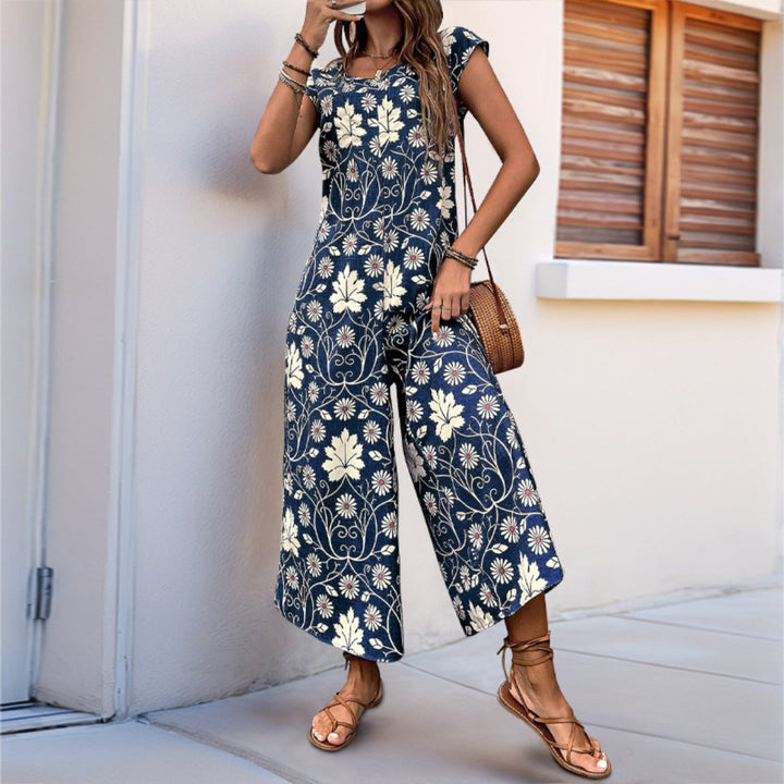 Drune | Lockerer Jumpsuit mit Blumendruck