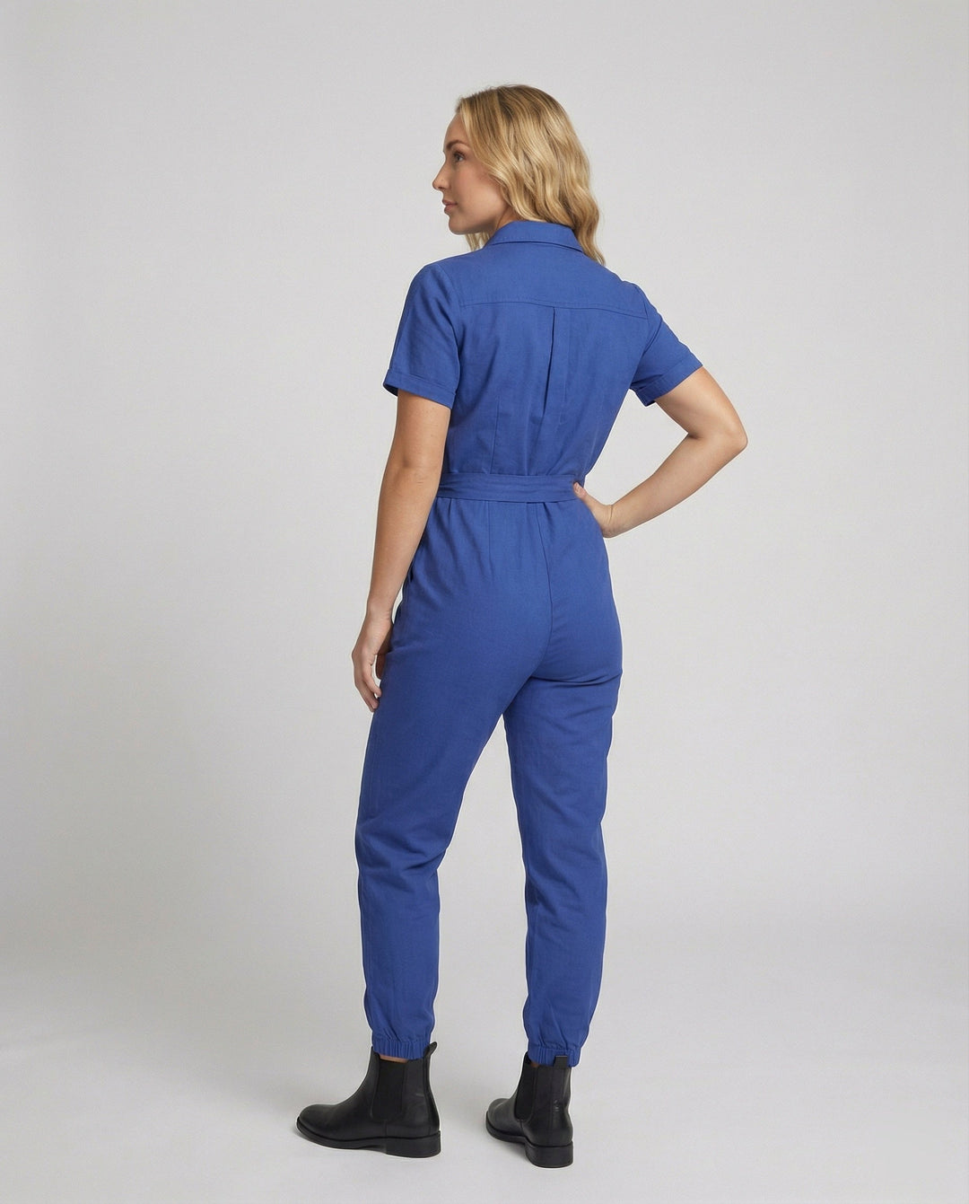 Damen lässiger Jumpsuit mit tailliertem Schnitt und durchgehender Knopfleiste Drune