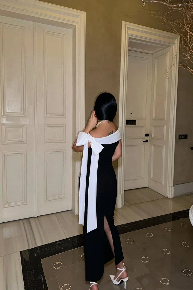 Drune | Elegantes Off Shoulder Midikleid in Schwarz Mit Weiß Schleifendetail