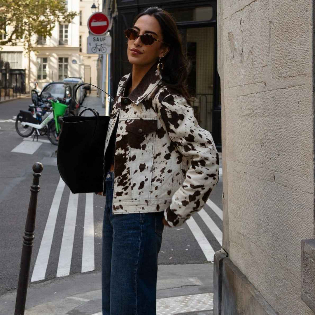Drune | Jacket with cow print, lapel collar and stylish snap buttons