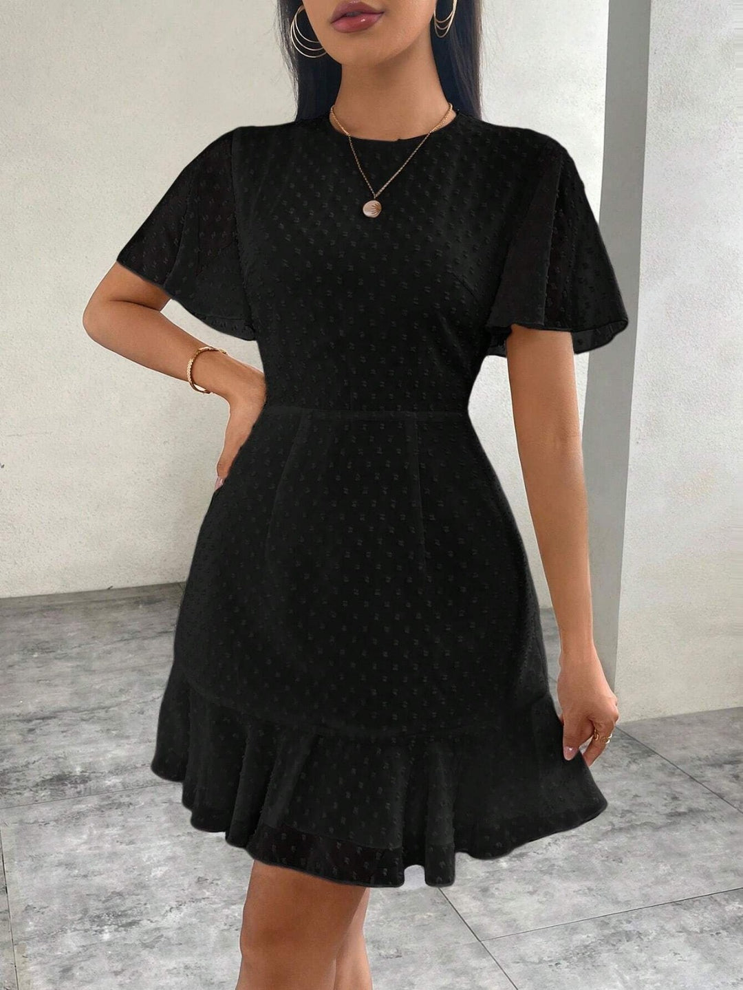 Drune | Dreidimensionales Kleid mit Rüschenrand und Punkten