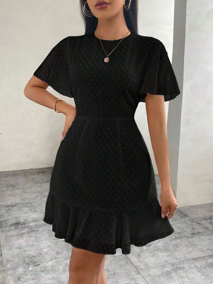 Drune | Dreidimensionales Kleid mit Rüschenrand und Punkten