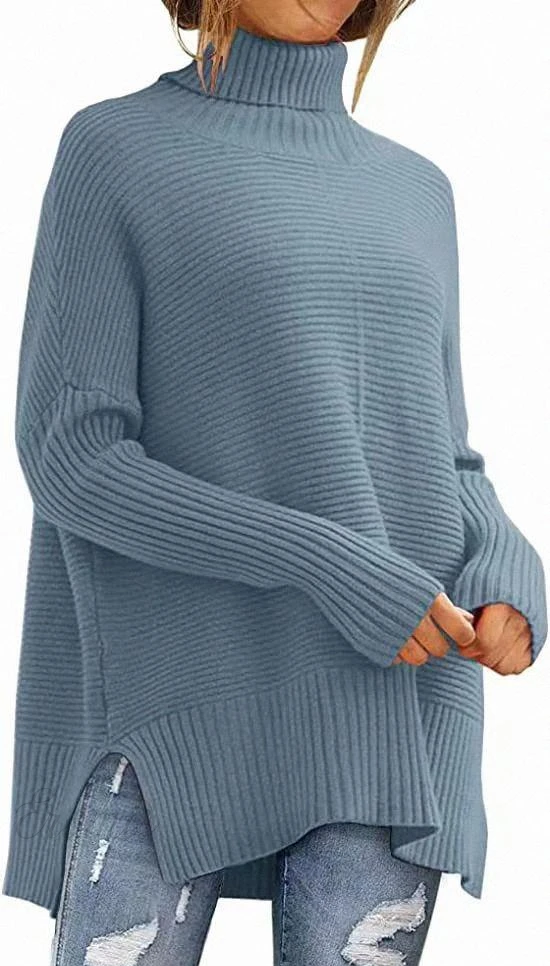 Drune | Moderner blauer Schlitz-Turtleneck-Strickpullover mit Fledermausärmeln Ideal für den Winter