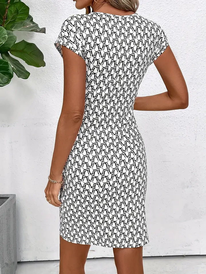 Drune | Elegantes Kleid mit Rundhalsausschnitt und Allover-Print