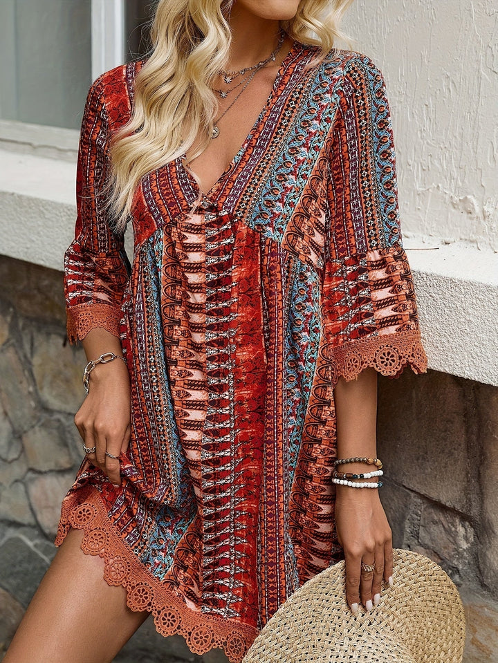 Drune | Elegantes Kleid mit V-Ausschnitt und Spitzenabschluss
