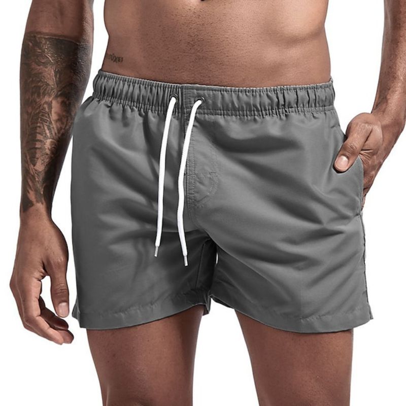 Drune | Einfarbige Herrenstrandshorts Schnelltrocknend
