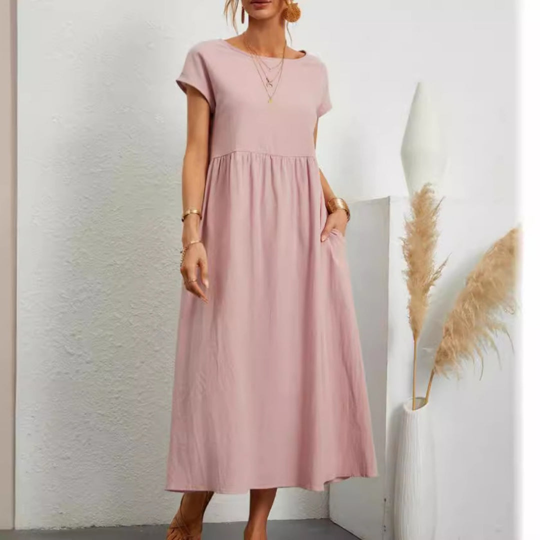 Drune | Einfarbiges ärmelloses lockeres Taschenkleid