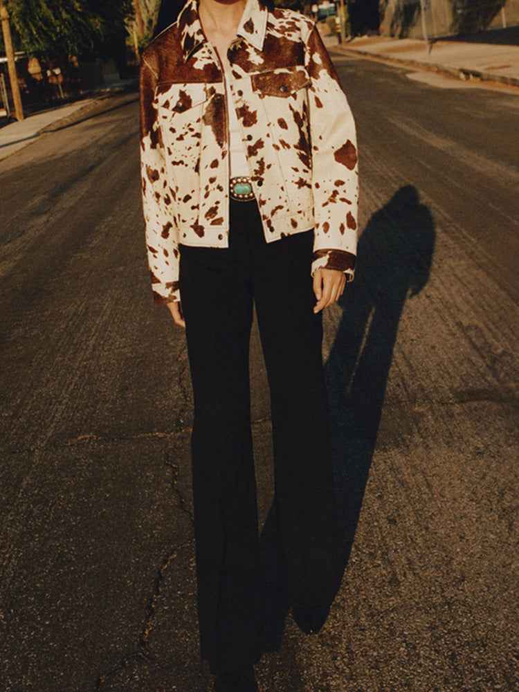 Drune | Jacket with cow print, lapel collar and stylish snap buttons