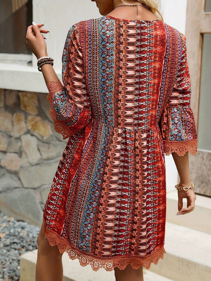 Drune | Elegantes Kleid mit V-Ausschnitt und Spitzenabschluss