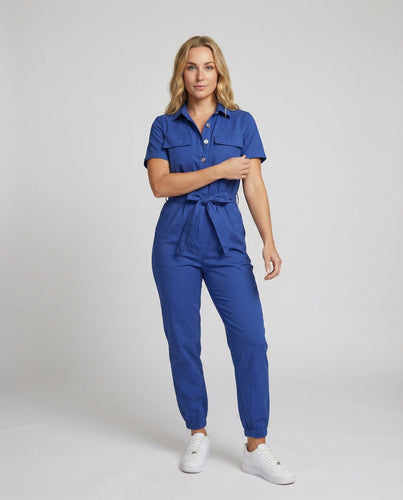 Damen lässiger Jumpsuit mit tailliertem Schnitt und durchgehender Knopfleiste Drune