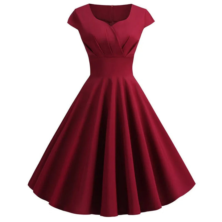 Drune | Vintage Sommerkleid mit großem V-Ausschnitt, lockerer Passform und Rüschen