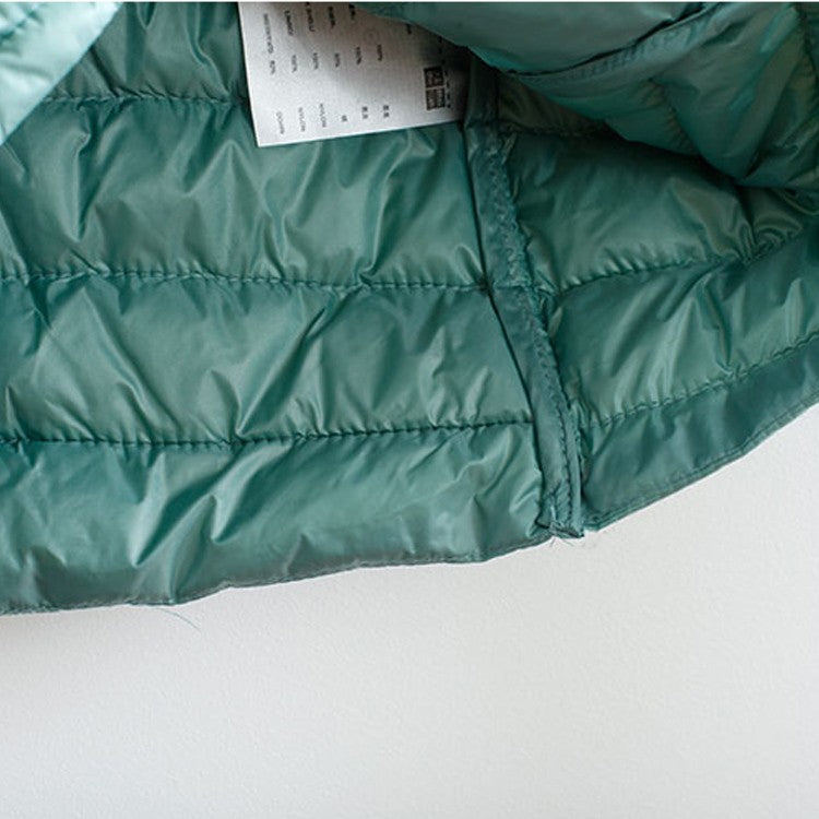 Drune | Elegance Essential" kragenlose kompakte Daunenjacke