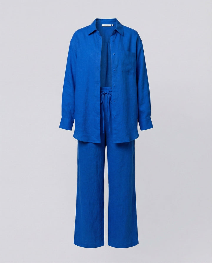 Damen Lässiges Leinen-Outfit mit weit geschnittenem Hemd und lockeren Hosen Drune