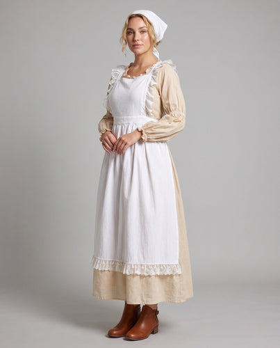 Frauen traditionelles Landhauskleid mit Rüschendetails und dekorativer Schürze Drune