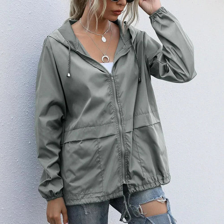 Drune | chic: leichte Jacke aus atmungsaktivem Material für Frauen