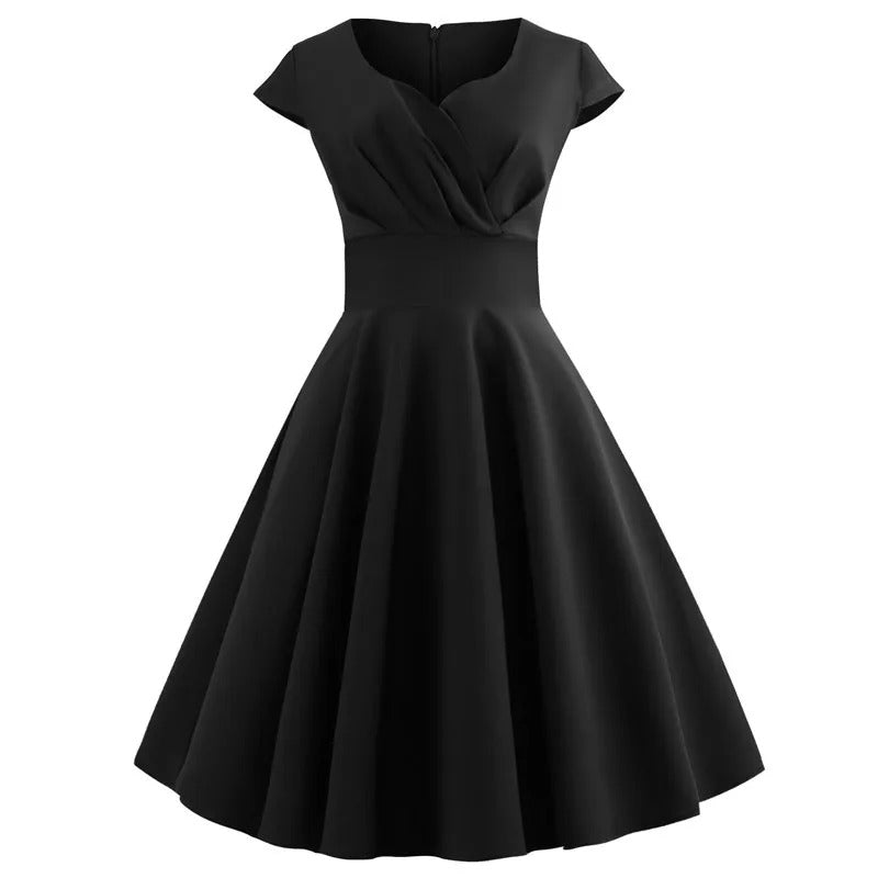 Drune | Vintage Sommerkleid mit großem V-Ausschnitt, lockerer Passform und Rüschen